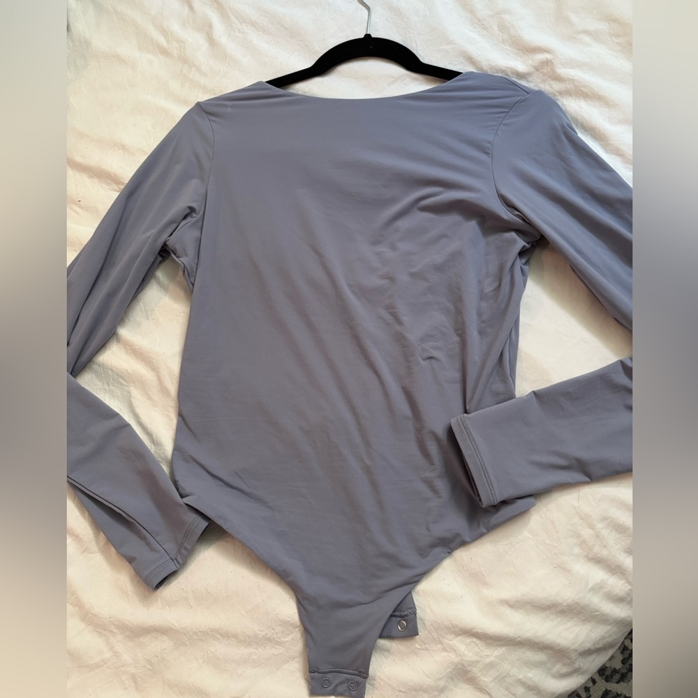 Skims open back bodysuit size L